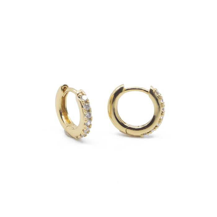 The Land of Salt CZ Diamond Huggie Hoops in Gold
