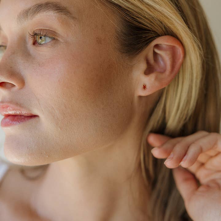 The Land of Salt Dara Red Garnet CZ Baguette Stud Earrings